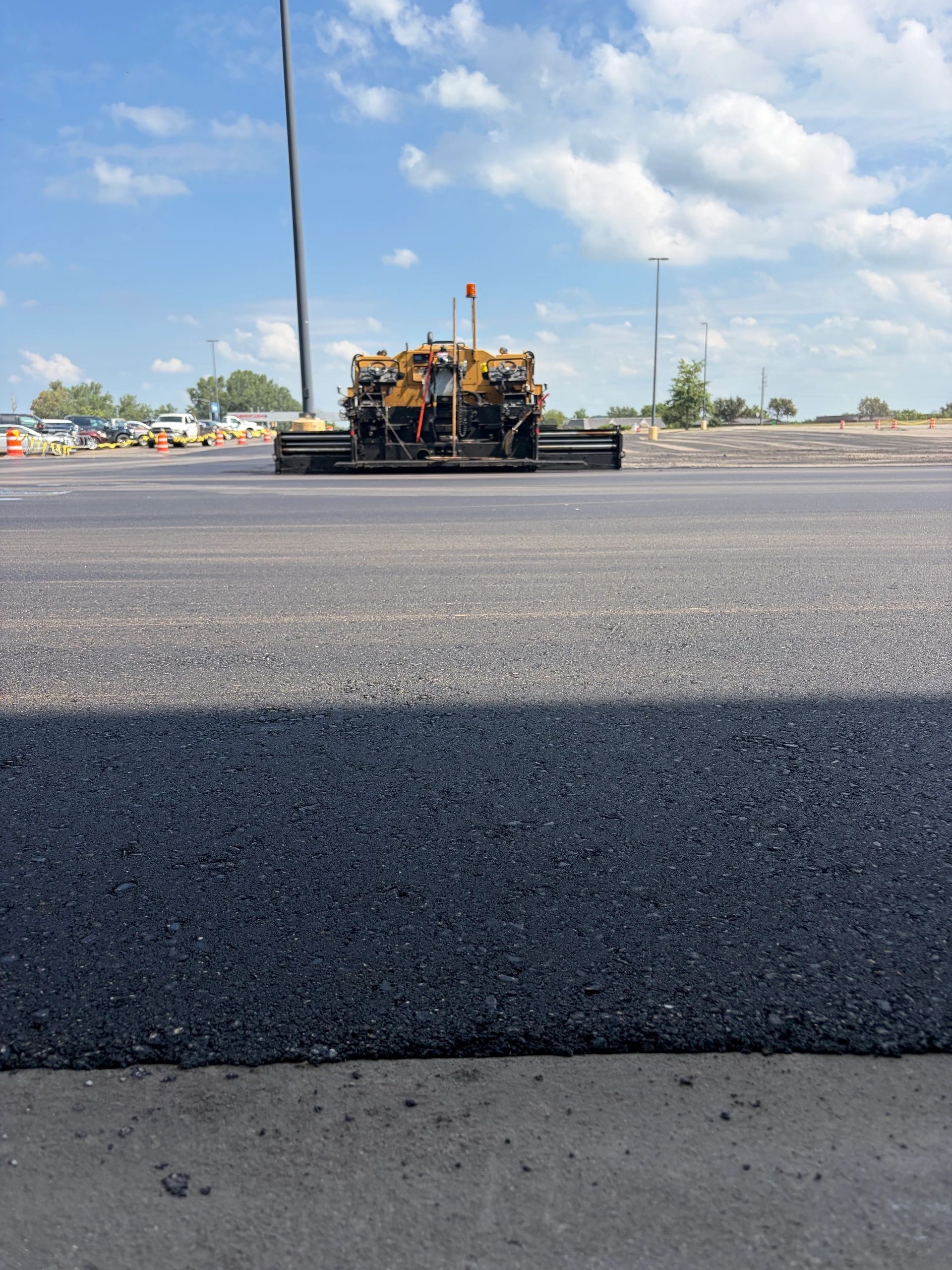 Freshly paved asphalt road surface